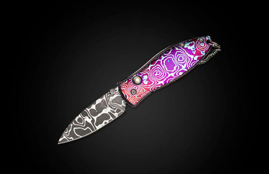 Knife pendant featuring Moku-Ti and hand-forged damascus blade